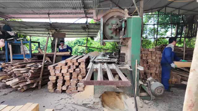 Sawing Planks At Rural Sawmill