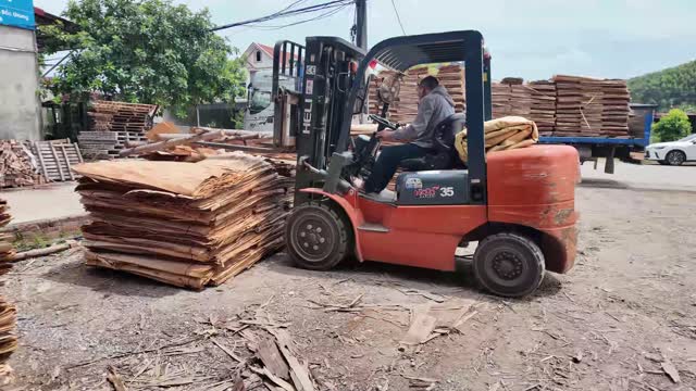 Forklift Moving Veneer Bundle