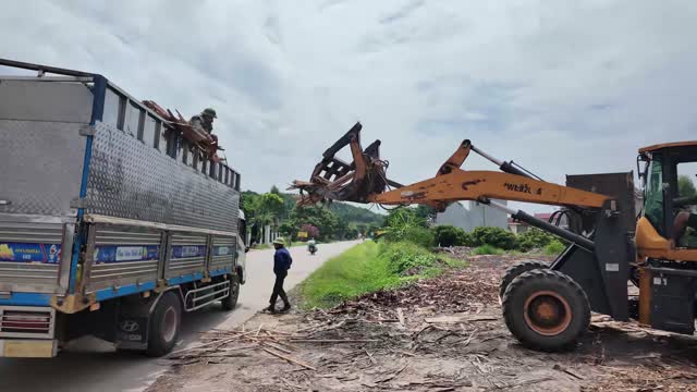 Loading Wood Scrap Onto Truck