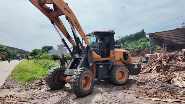 Wheel Loader By Scrap Pile