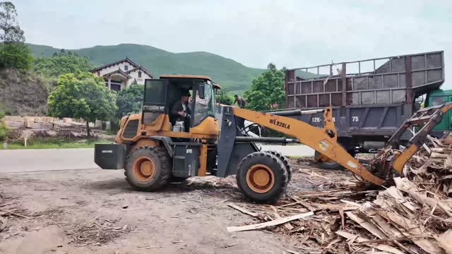 Loading Wood Scrap Into Truck