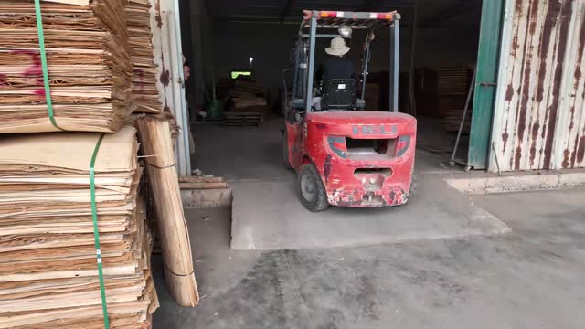 Forklift At Workshop Doorway