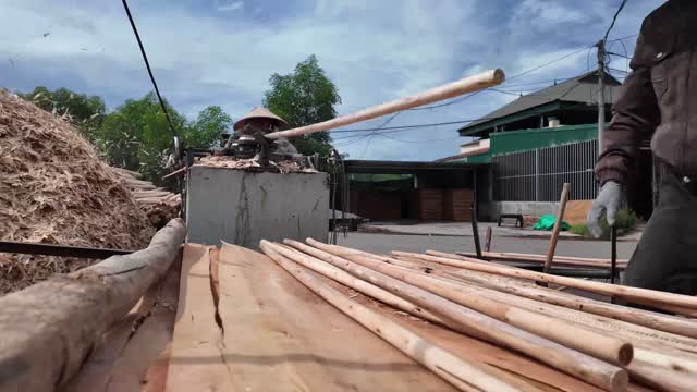 Worker Operating Dowel Machine