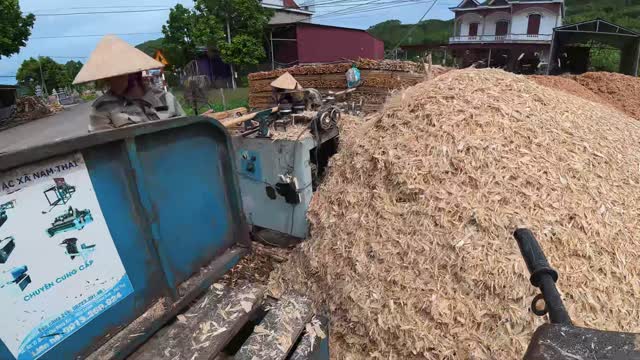 Aerial Over Sawdust And Machine