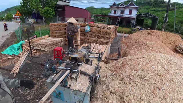 Worker And Timber From Above