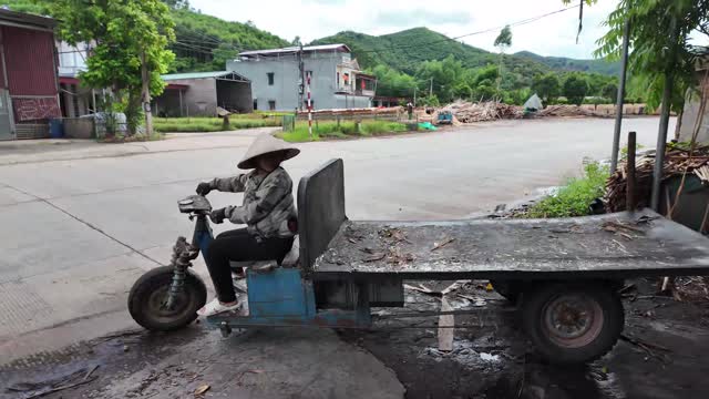 Woman Riding Cargo Tricycle
