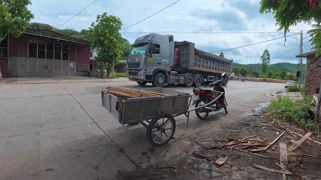 Truck Passing Timber Cart