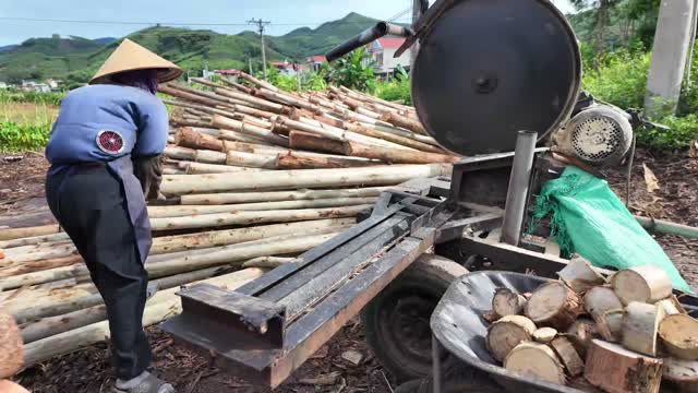Feeding Logs Into Circular Saw