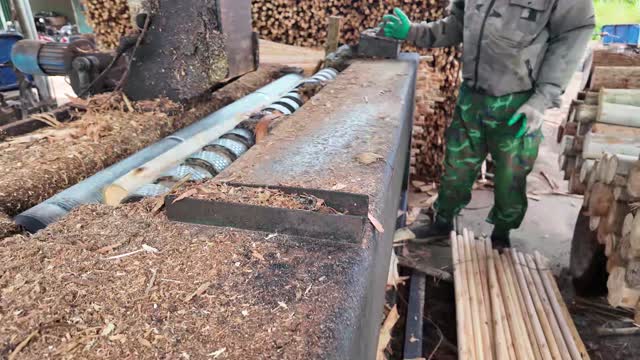 Feeding Log Through Rounder