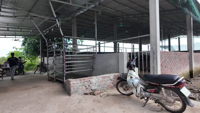 Open Farm Shed With Motorbike