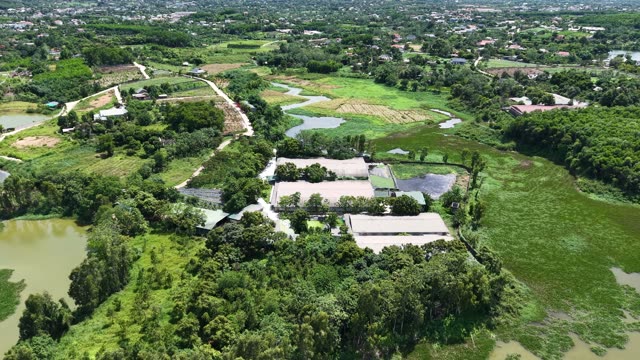 Farm Among Fields And Ponds