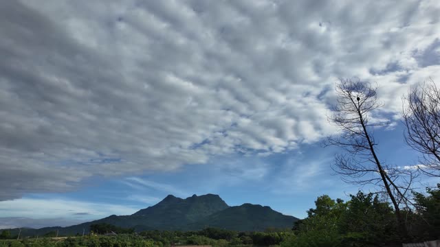 Dramatic Clouds Over Mountain
