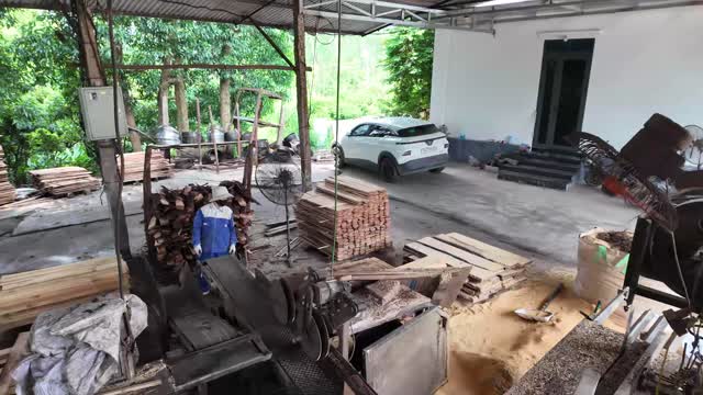 Sawmill Yard With House