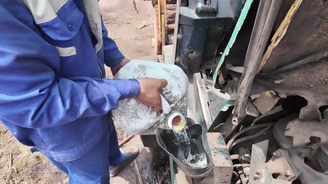Adding Oil To Forklift Engine