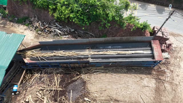 Excavator Grapple Sorting Bark