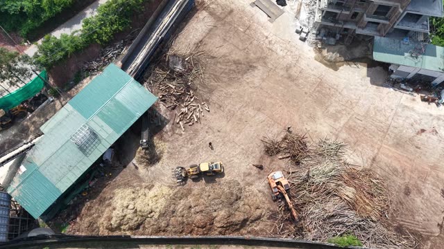 Aerial View Of Timber Yard Loaders