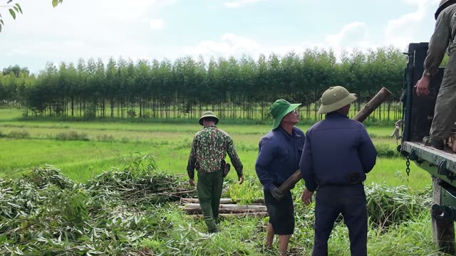 Farmers Talking By The Field