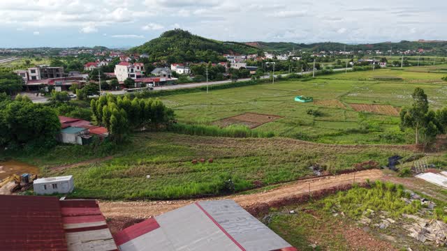 Village Houses By Green Fields