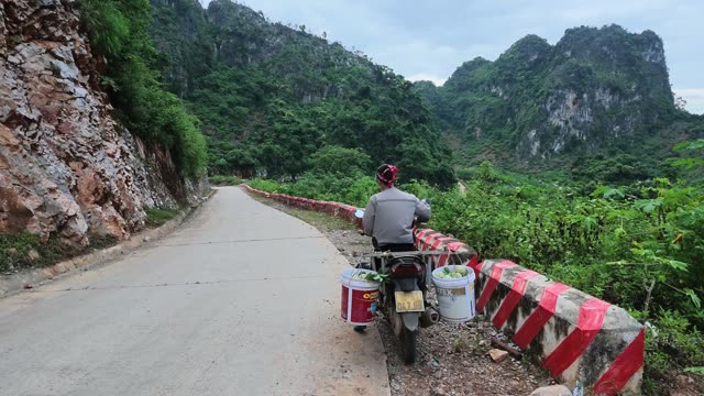 Motorbike Parked On Mountain Road