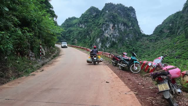 Two Men With Motorbike And Fruit Baskets