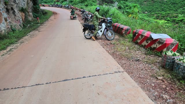 Man Arranging Basket On Motorbike Rack