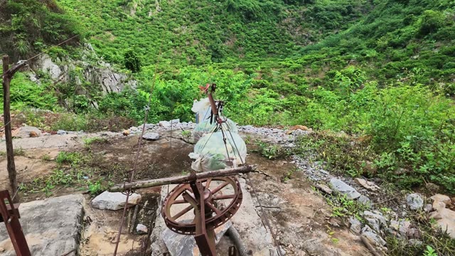 Rusty Wheel Mechanism On Hillside