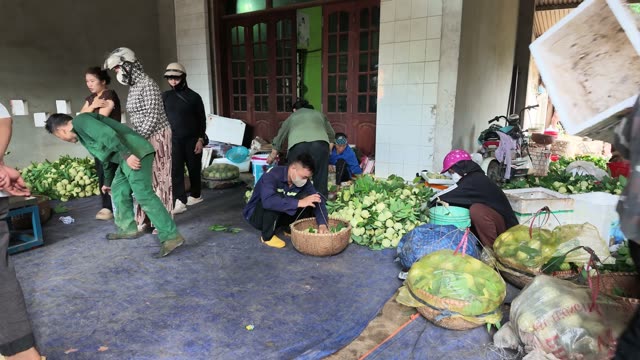 Man Arranging Basket By Bucket