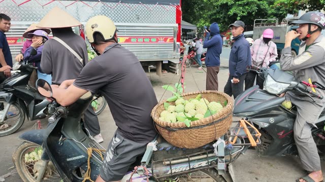 Motorbikes Loaded With Fruit Baskets