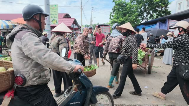 Woman Buying Custard Apples At Market