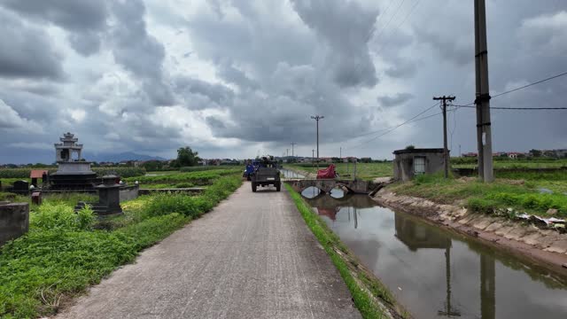 Rural Road Through Green Fields