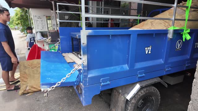 Loaded Truck On Village Street