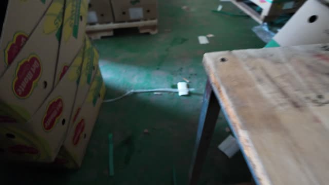 Stacked Del Monte Boxes On Floor