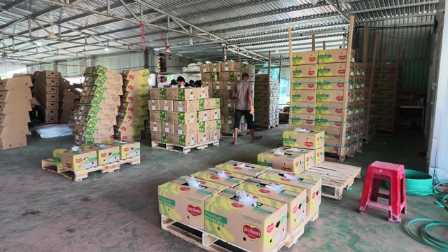 Stacked Banana Boxes On Wooden Pallets