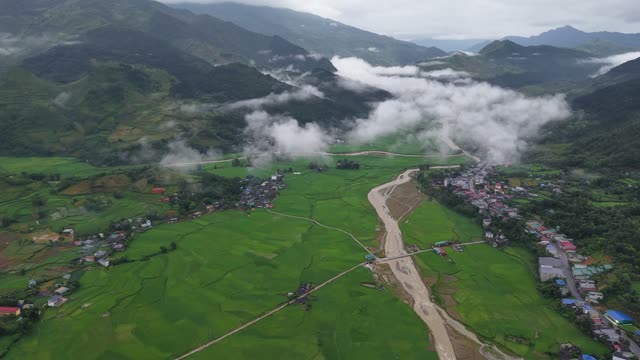 Misty Clouds Over Mountain Village