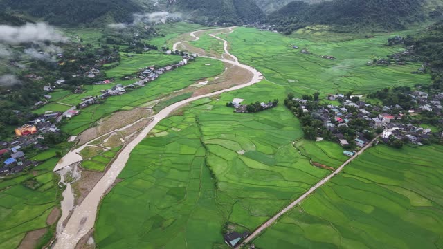 Village Beside Muddy River Bend