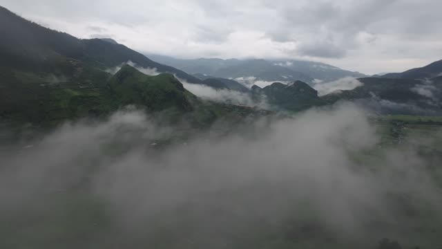 FPV Flight Through Misty Mountain Ridges