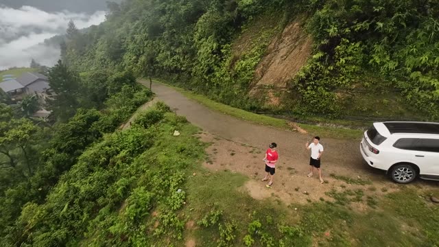 FPV Passing Limestone Cliff Jungle