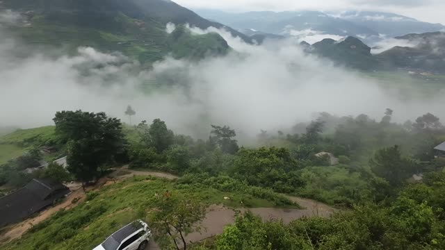 Green Valley Beneath Cloud Cover