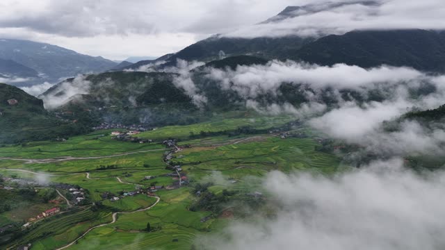 Cloud Covered Valley With River Glimpse