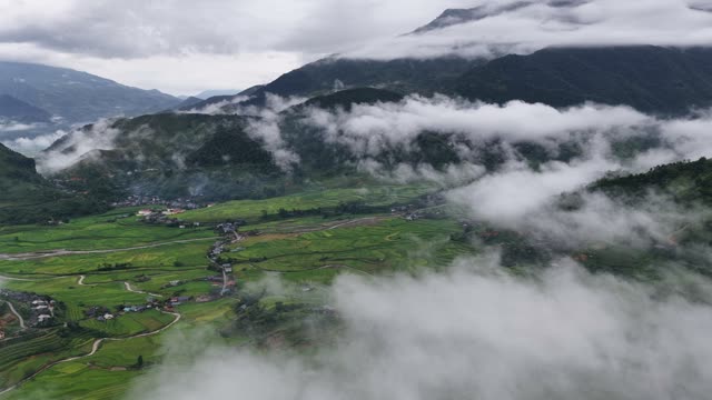Valley Village Beneath Thick Cloud Cover