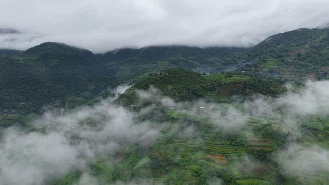 River Winding Through Foggy Valley
