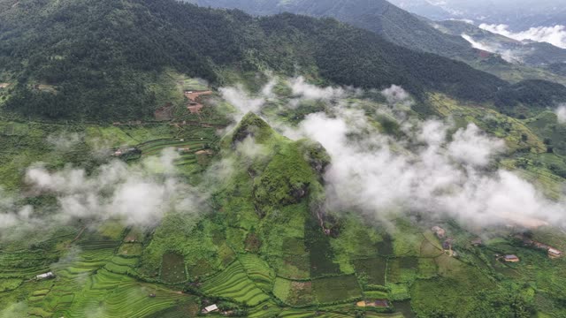 Fog Drifting Over Mountain Village