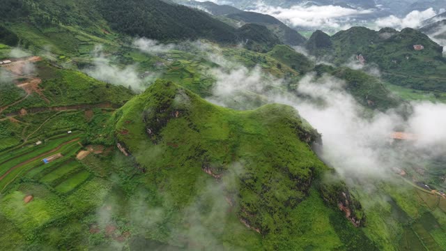 Rugged Karst Peaks Through Fog