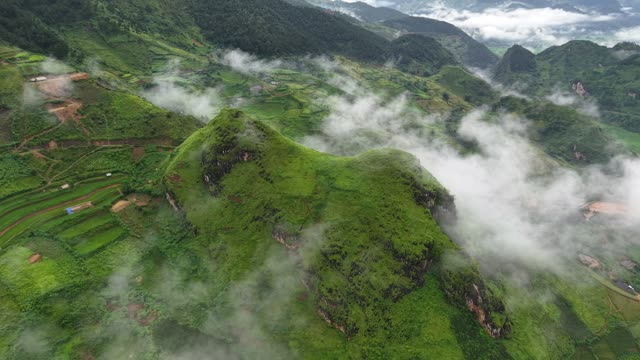 Foggy Ridge Above Terraced Slopes