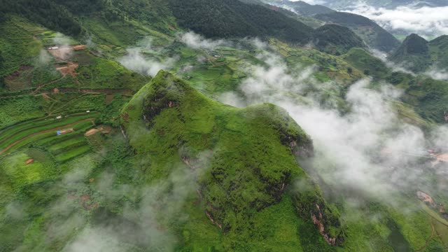 Distant Valley Village Through Fog