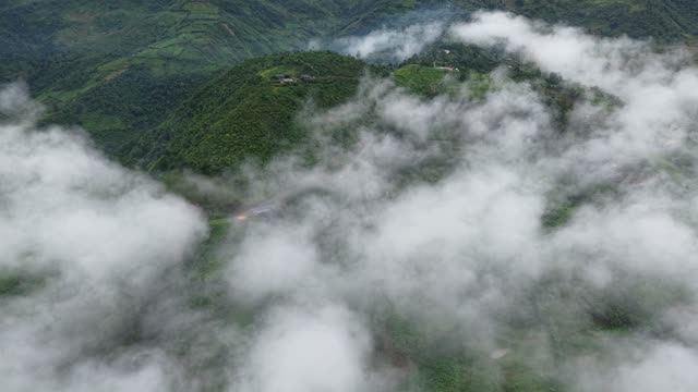 Hilltop Village Wrapped In Cloud