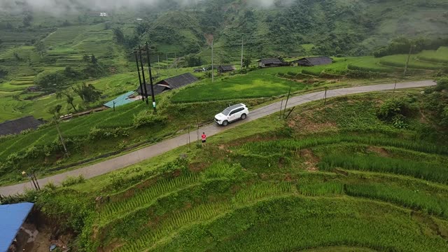 FPV Skimming Terraces Near Thatched Hut