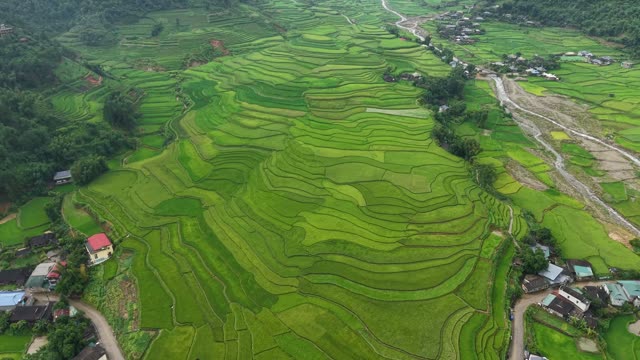 Village Terraces Beside Winding River