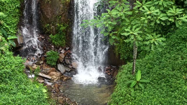 Waterfall Into Rock Pool