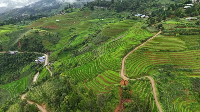 Terraces Beneath Cloudy Mountains